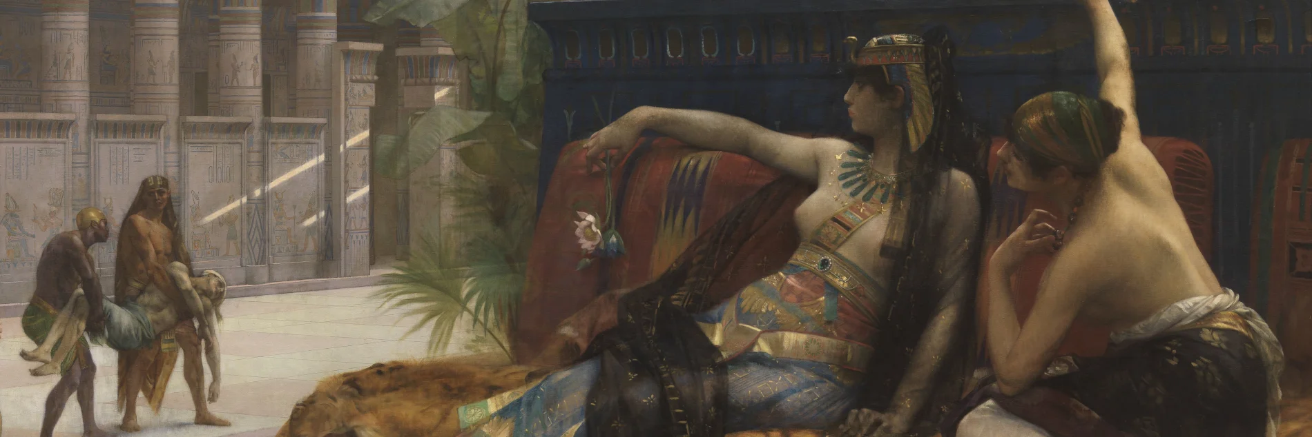Two women lounging on luxurious furniture in an ancient outdoor setting, featuring grand columns and walls decorated with Egyptian motifs and hieroglyphs. In the background, two men carry a lifeless figure away. One woman holds a lotus flower by her fingertips, while the other leans forward, both looking to the lifeless figure apathetically.